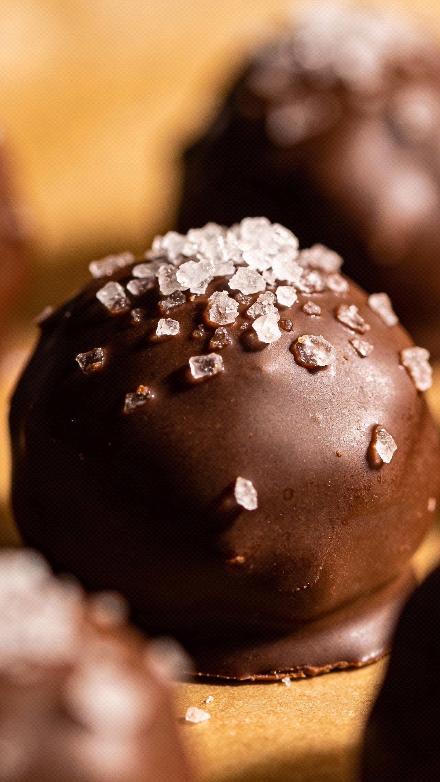 single keto fat bomb with flaky sea salt garnish