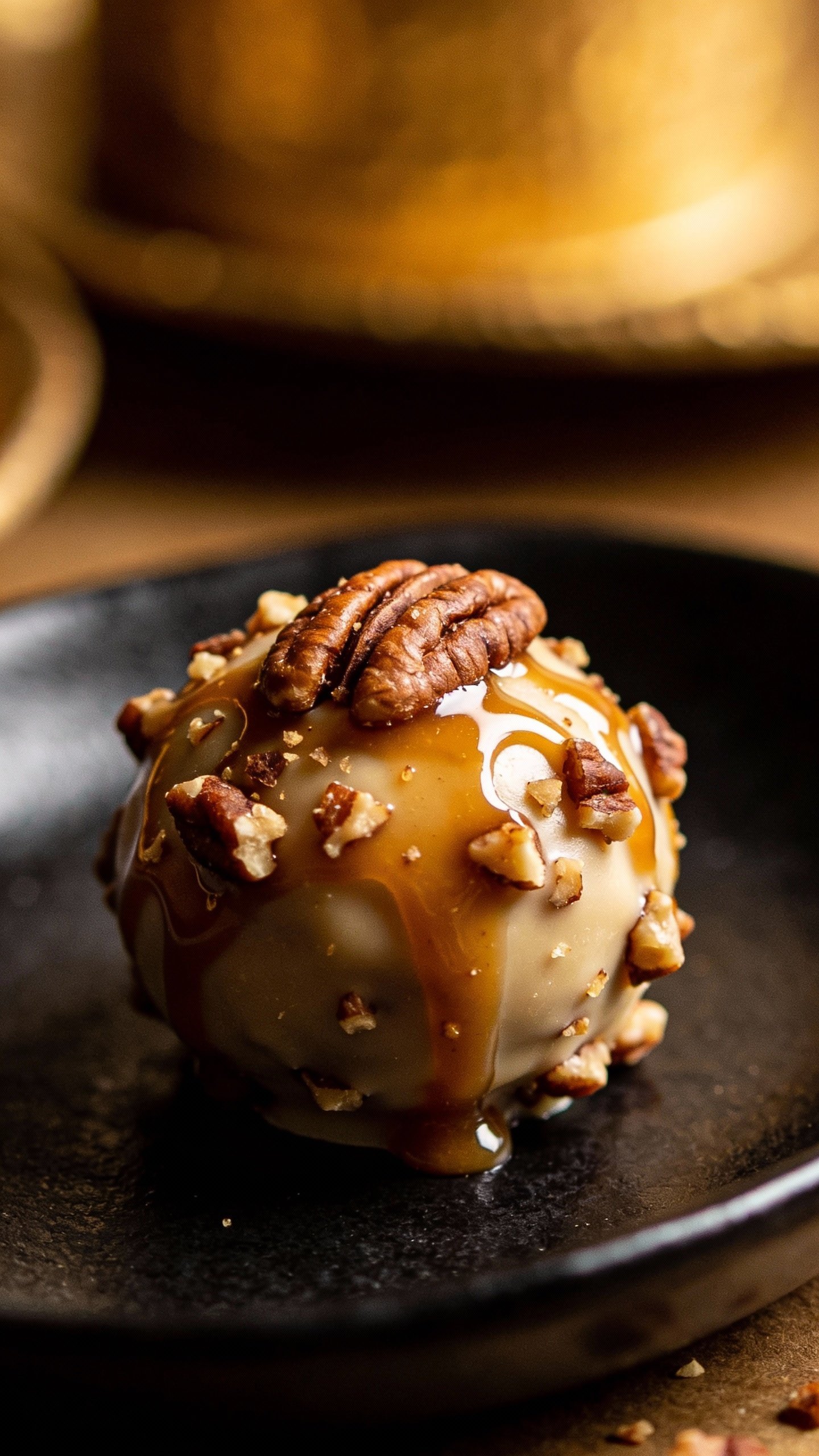 single maple pecan fat bomb on matte black plate
