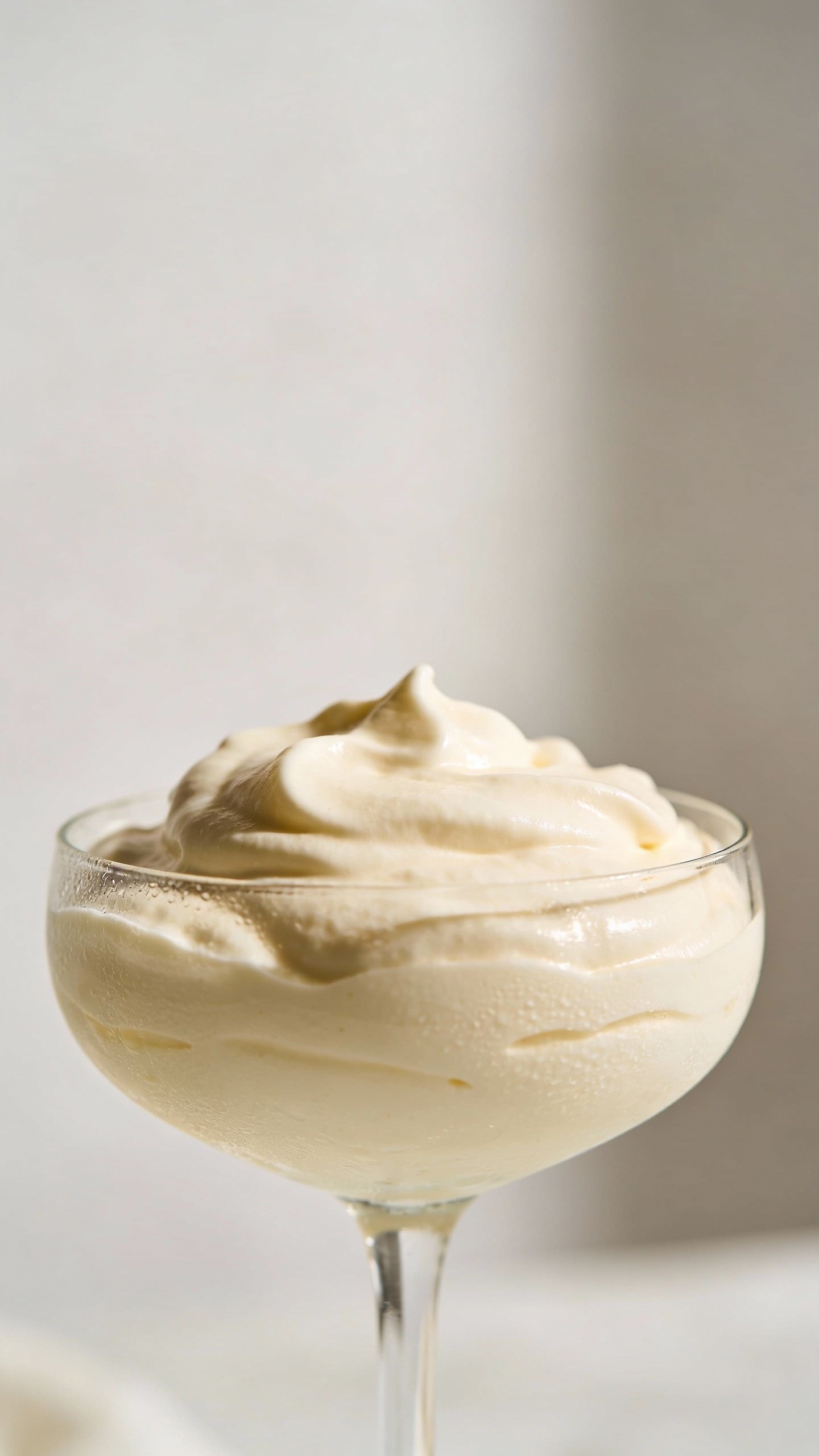 single glass dessert cup of keto vanilla mousse, chilled