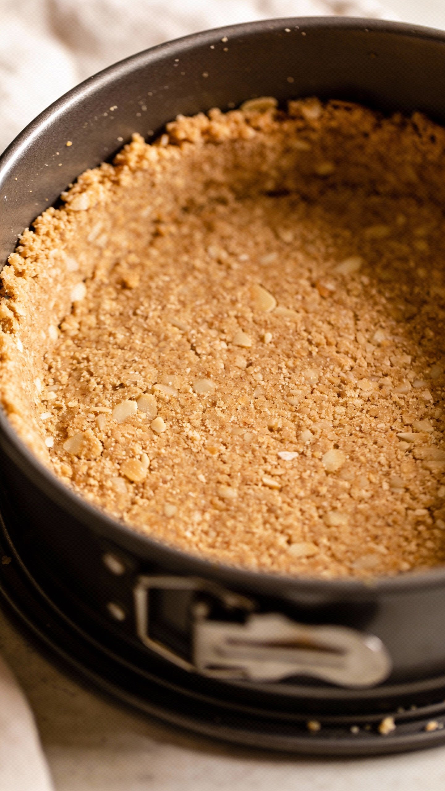overhead keto almond flour crust in springform pan