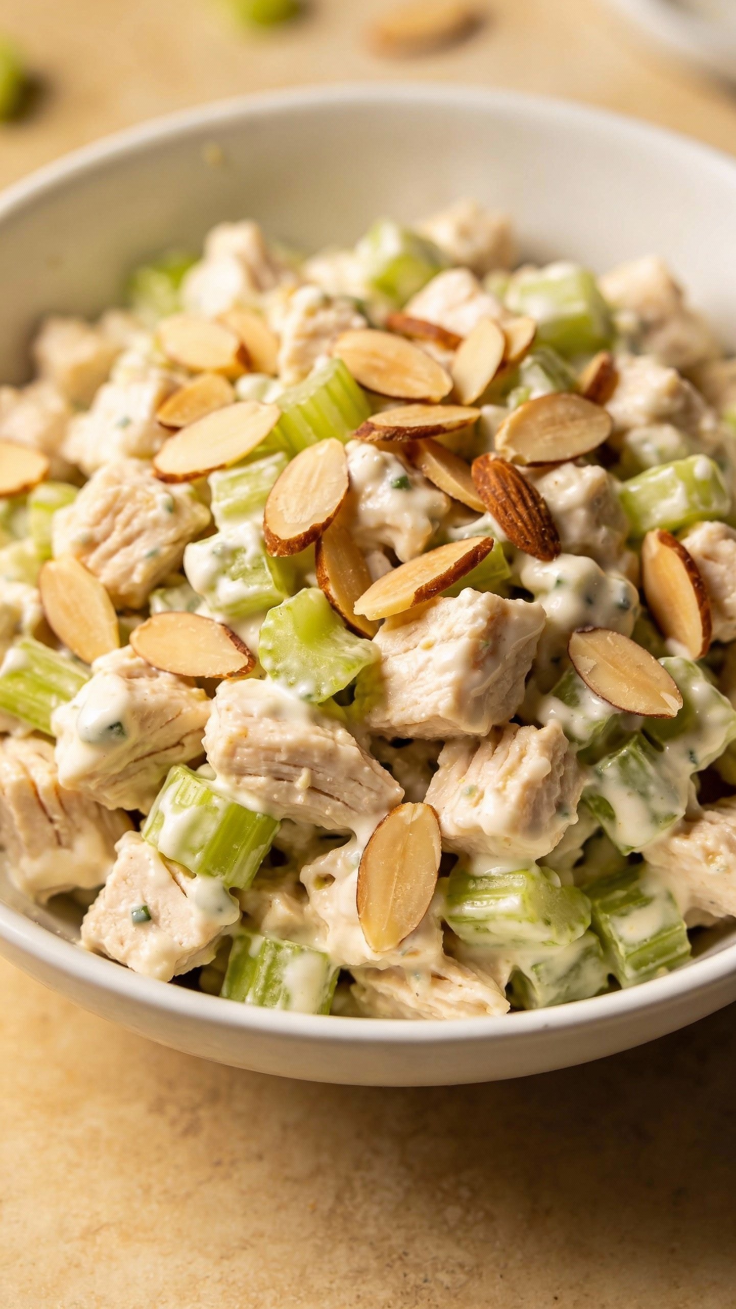 overhead shot of classic keto chicken salad in white bowl