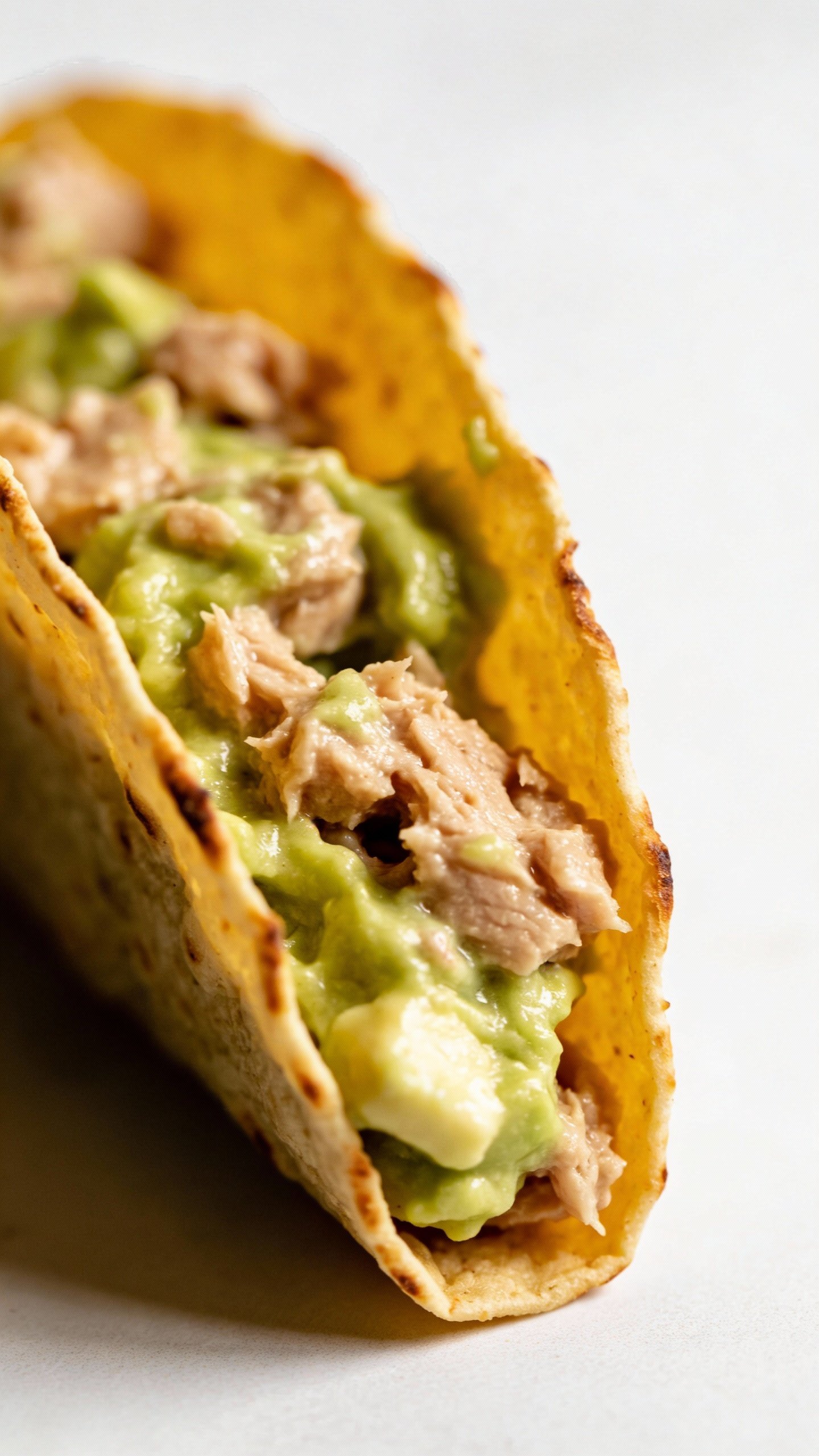 single low-carb tortilla filled with creamy avocado tuna
